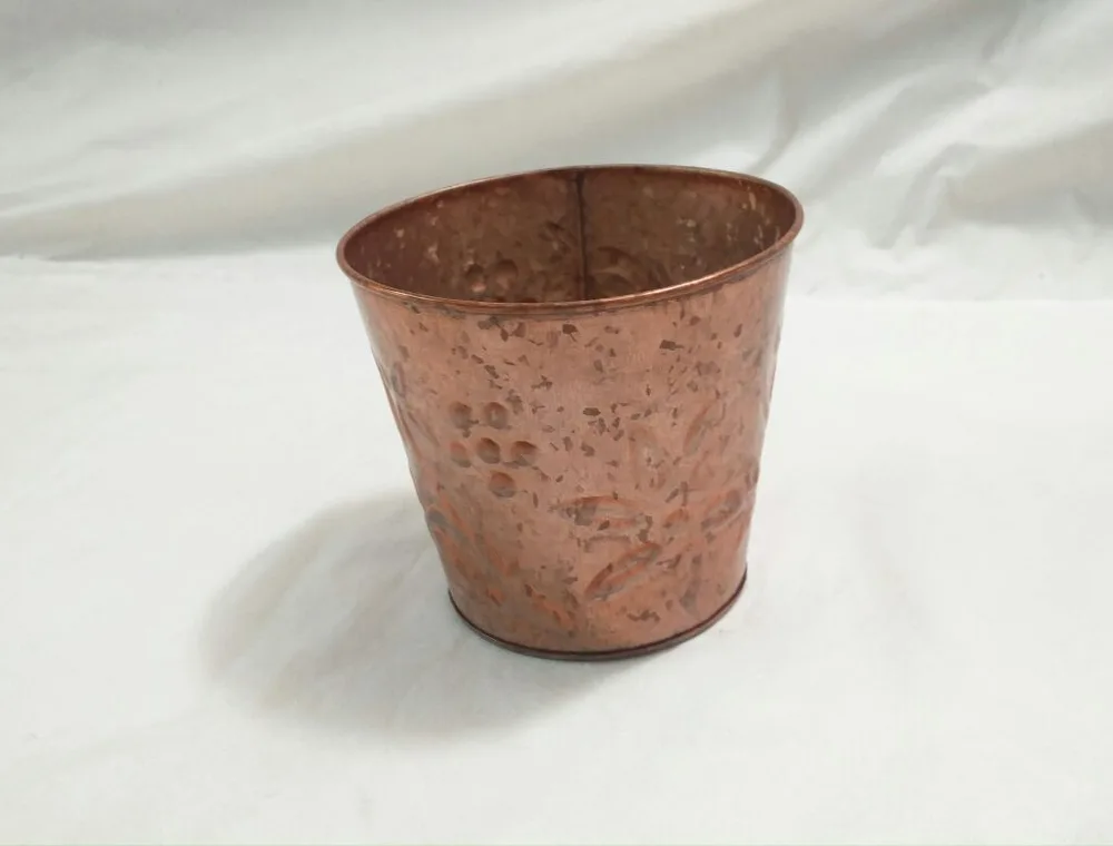 Copper-coloured hammered metal finish sample